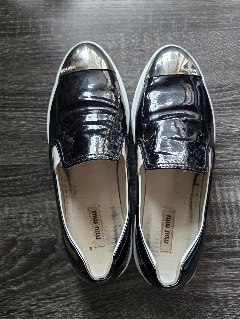 Miu Miu Black Patent Leather Slip-On Sneakers with Silver Cap Toe